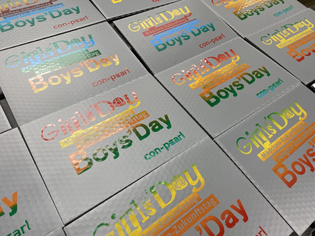 Labeled con-pearl boards for Girls & Boys Day 2024