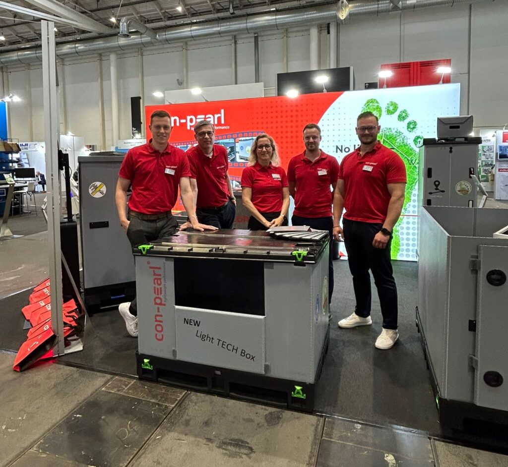 Unser Messestand plus Messeteam